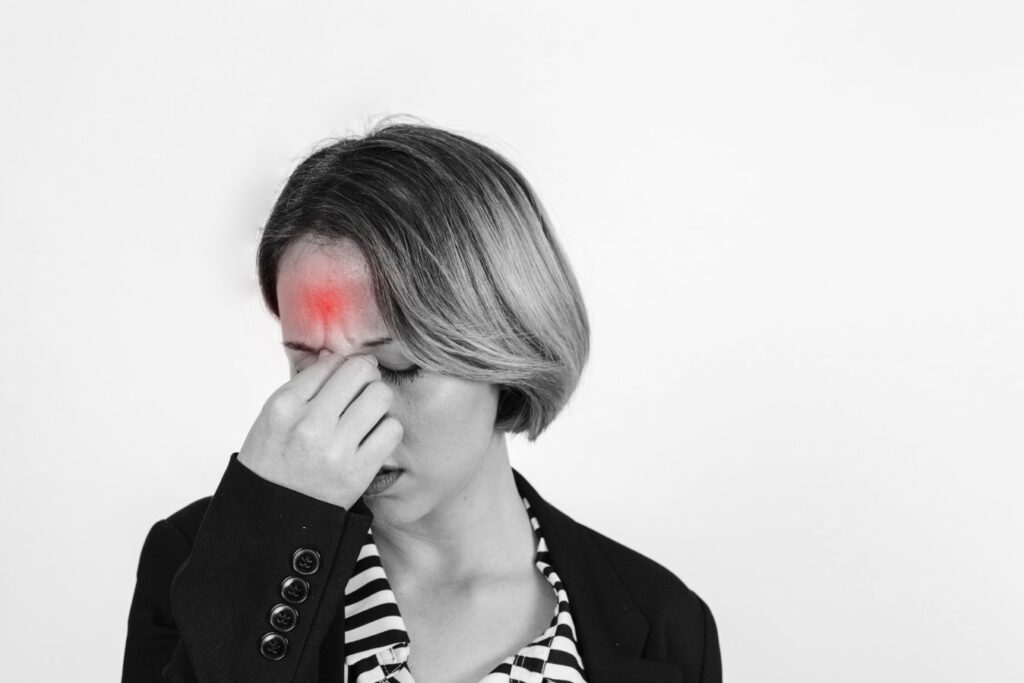 woman with headache studio